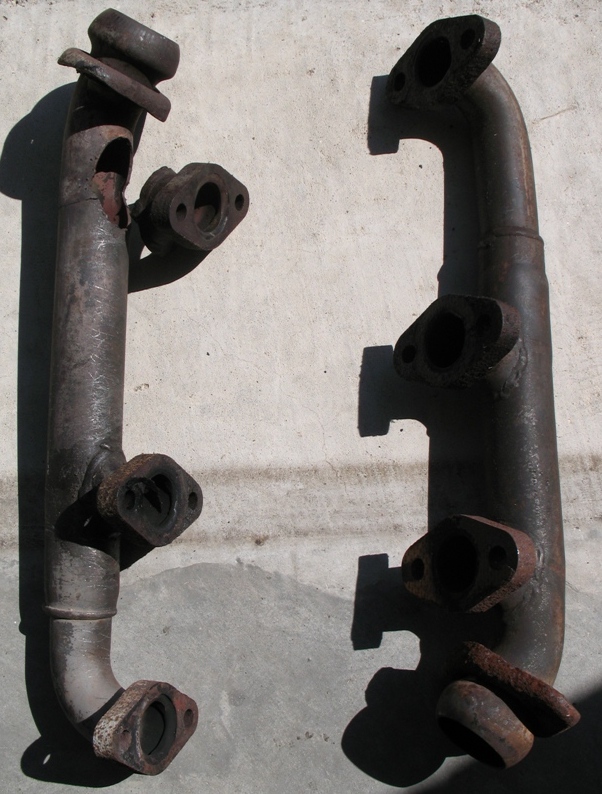 V6 Exhaust Manifolds. 1 good set, 1 set w/ broken and cracked front